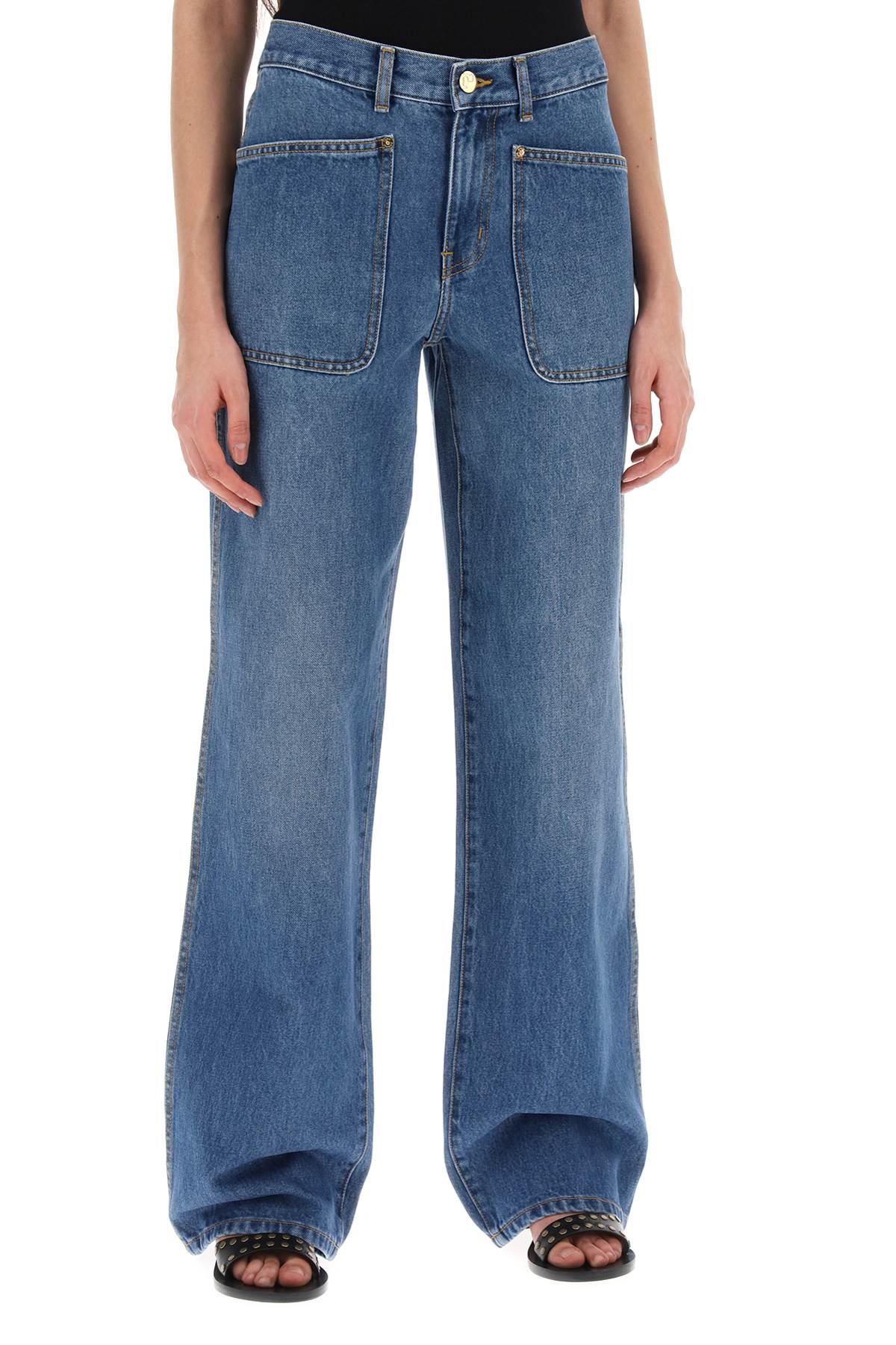 Tory Burch high-waisted cargo style jeans in image 1