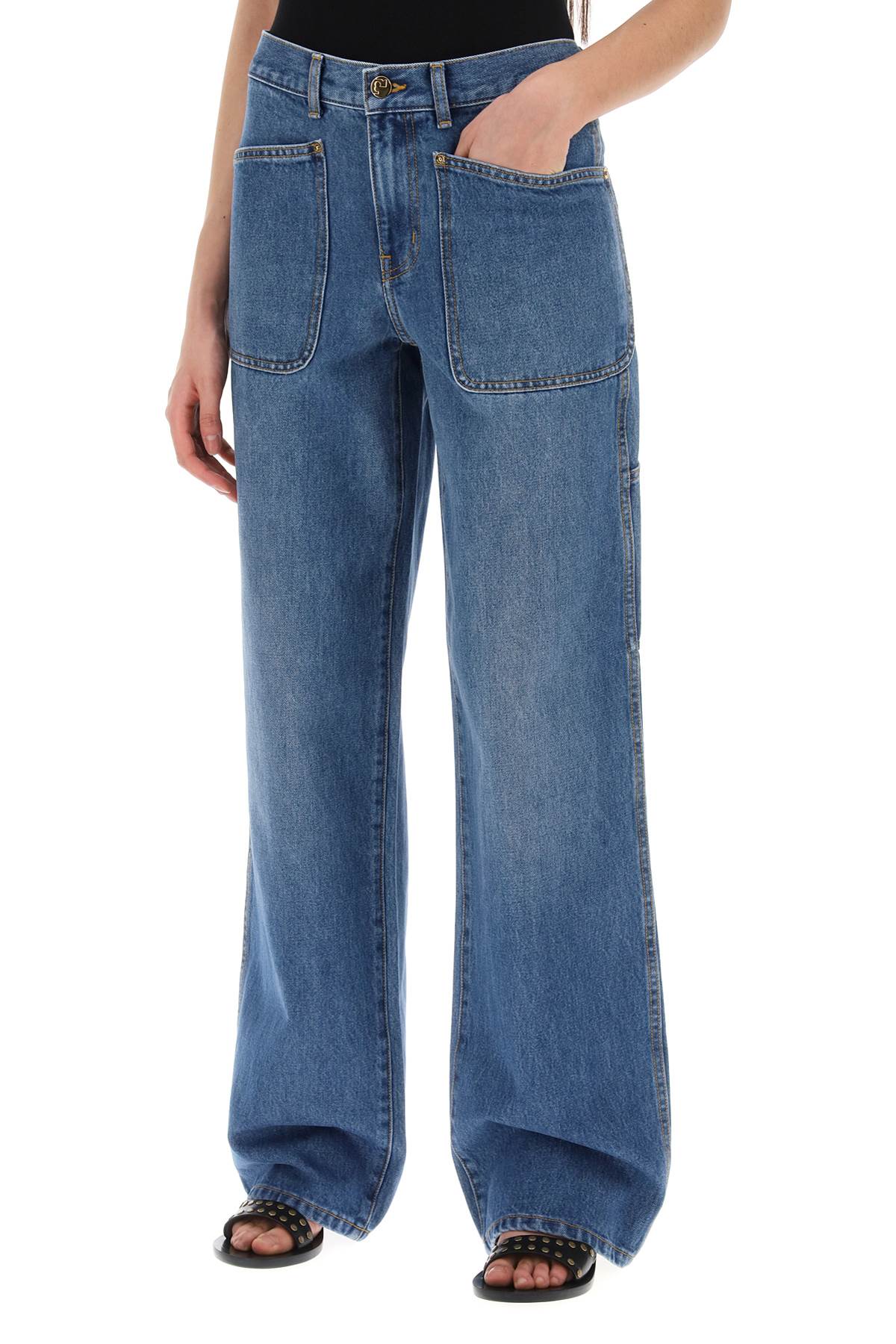 Tory Burch high-waisted cargo style jeans in image 3