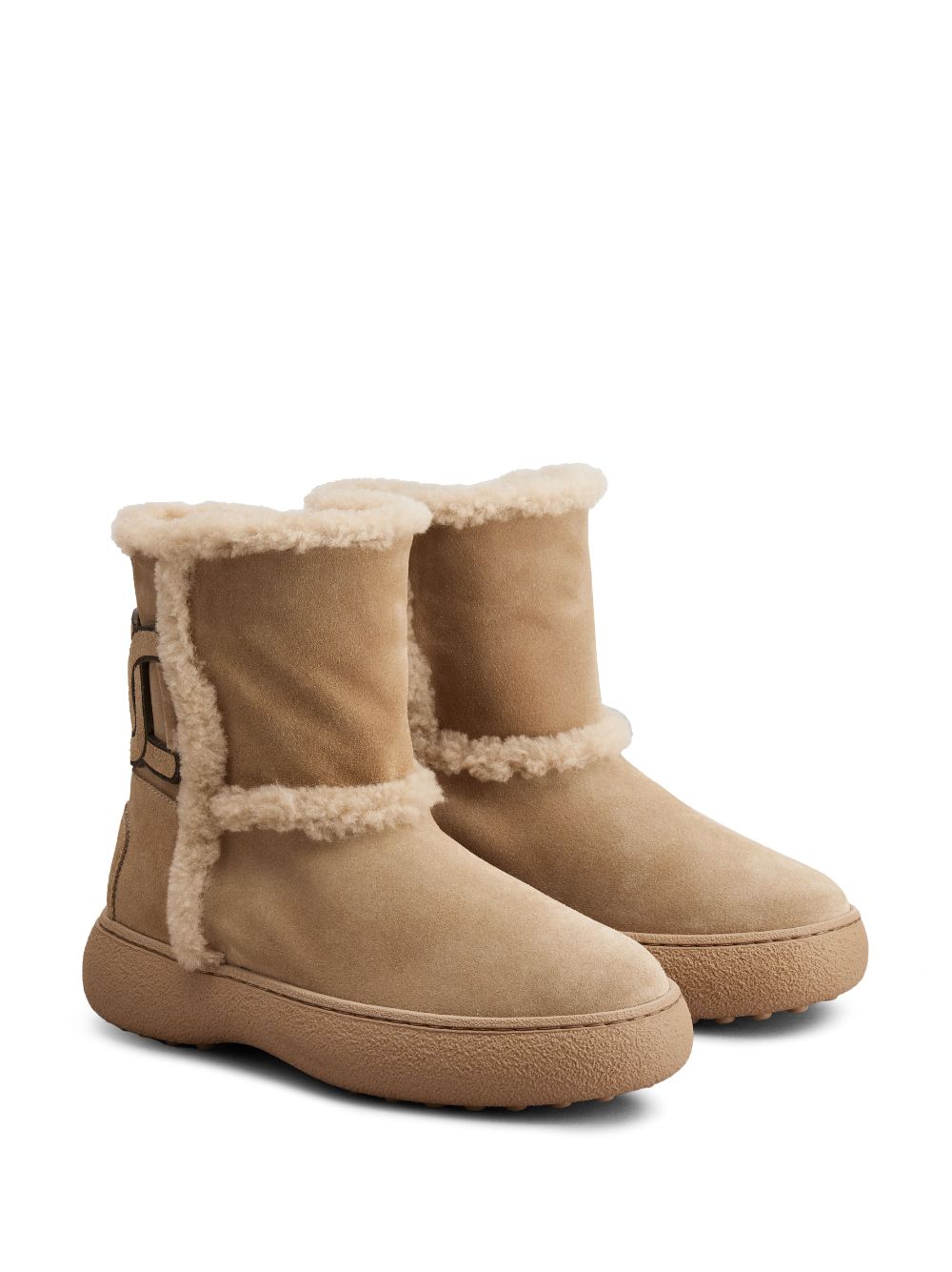 Tod's Beige Sheepskin Slip-On Boots image 1