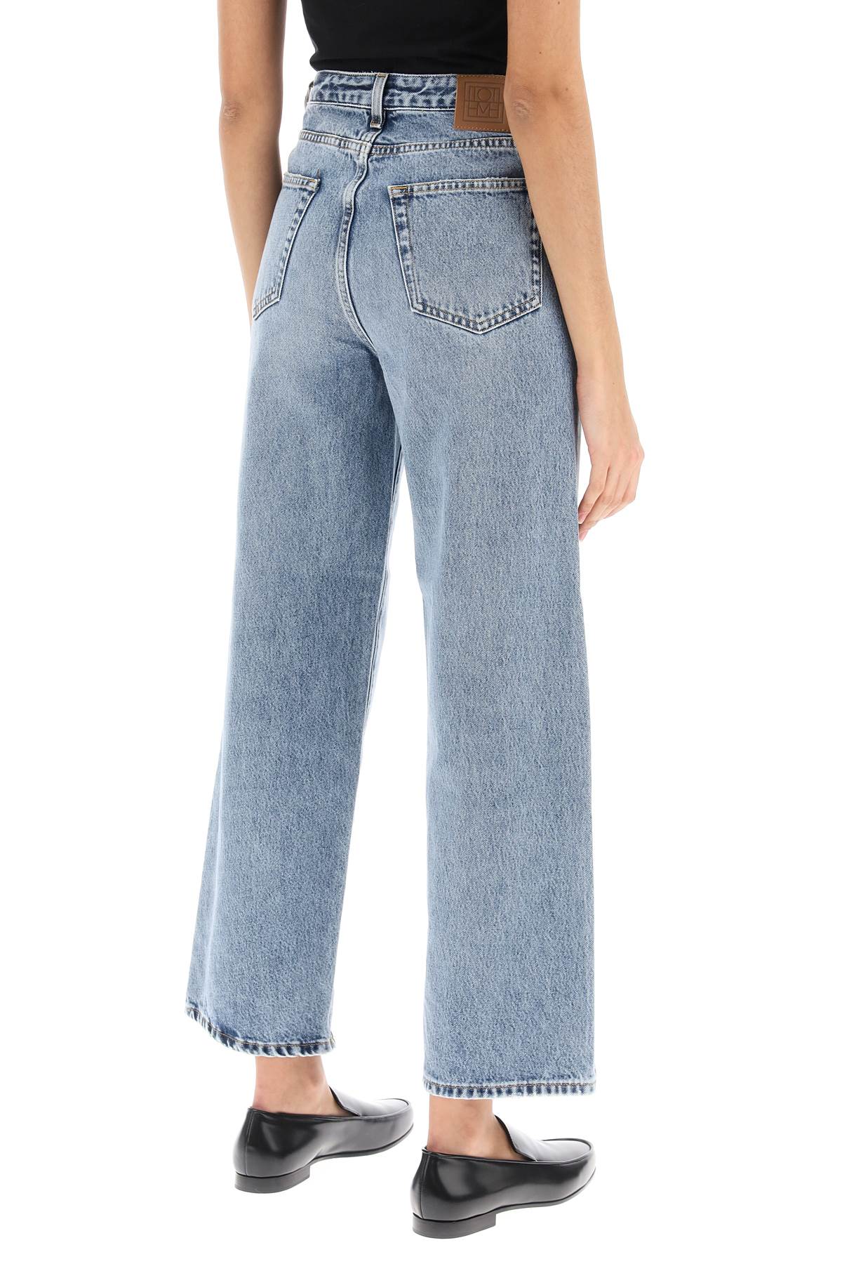 Toteme cropped flare jeans image 2