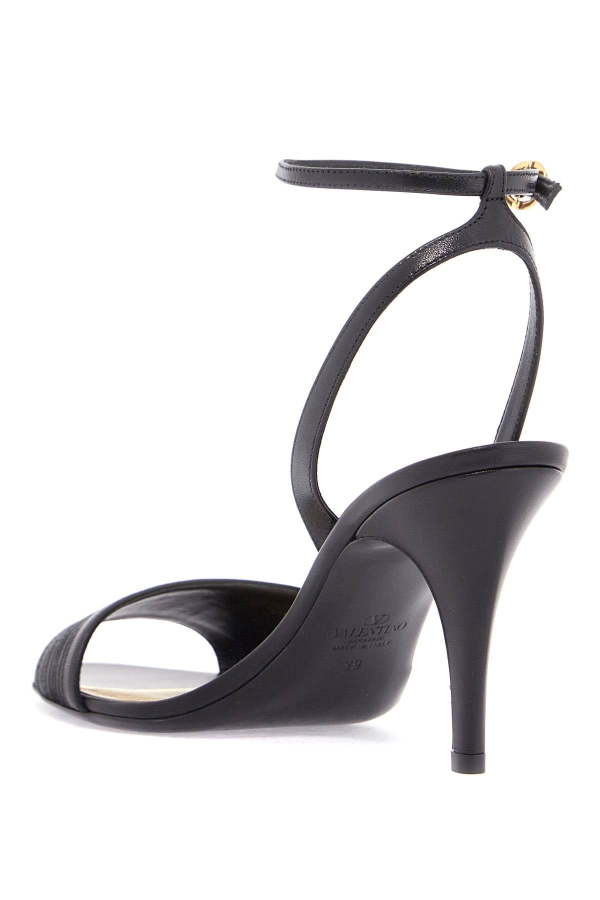 Valentino Garavani black goat leather sandals with gold buckle and stiletto heel image 2