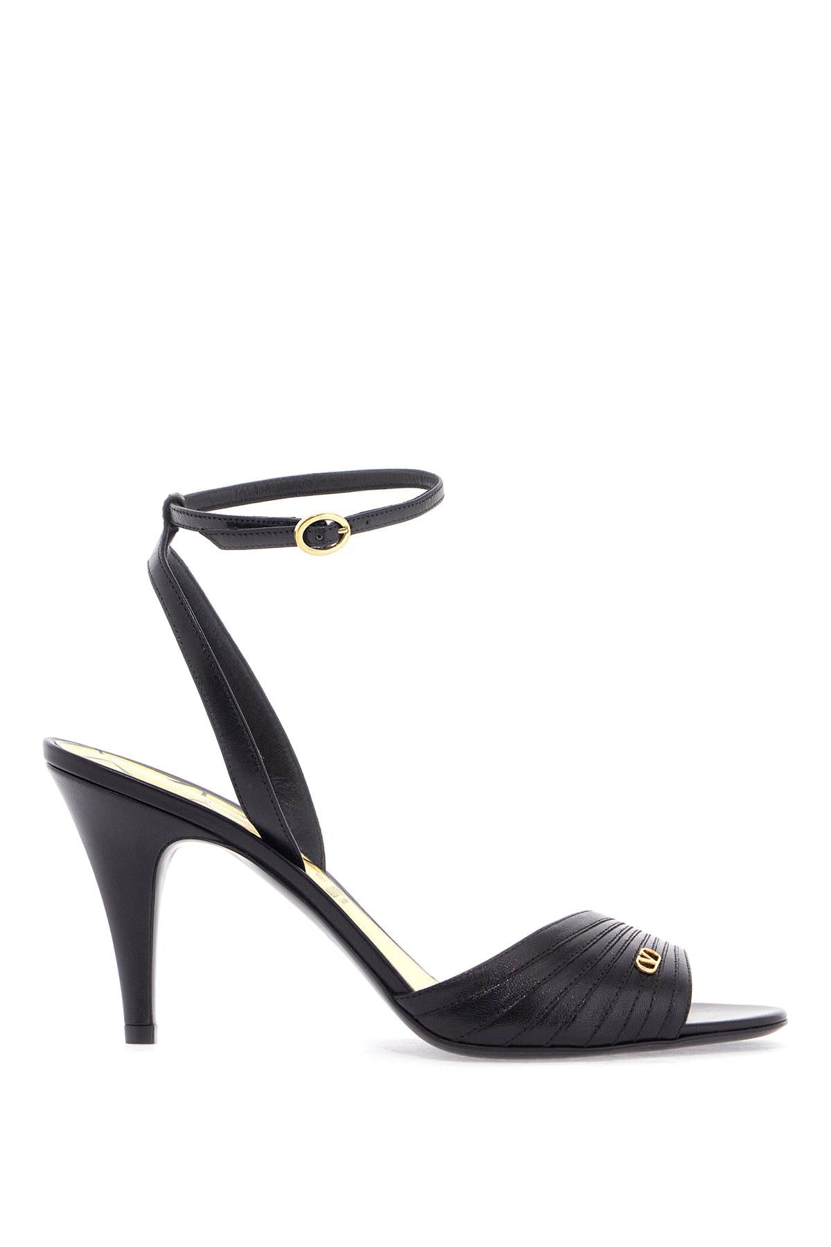 Valentino Garavani black goat leather sandals with gold buckle and stiletto heel image 0