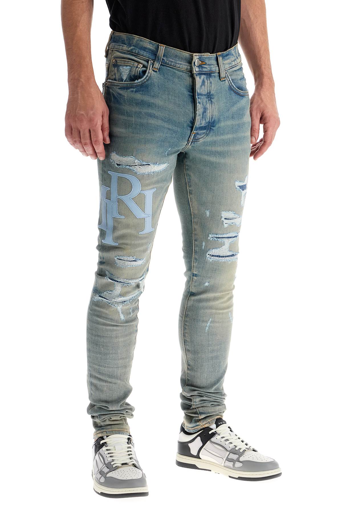 Amiri leather logo jeans with eight words image 1