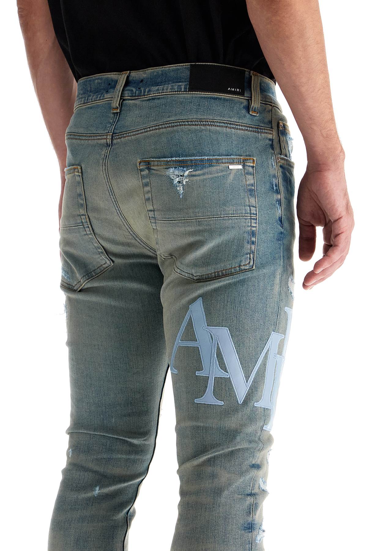 Amiri leather logo jeans with eight words image 3