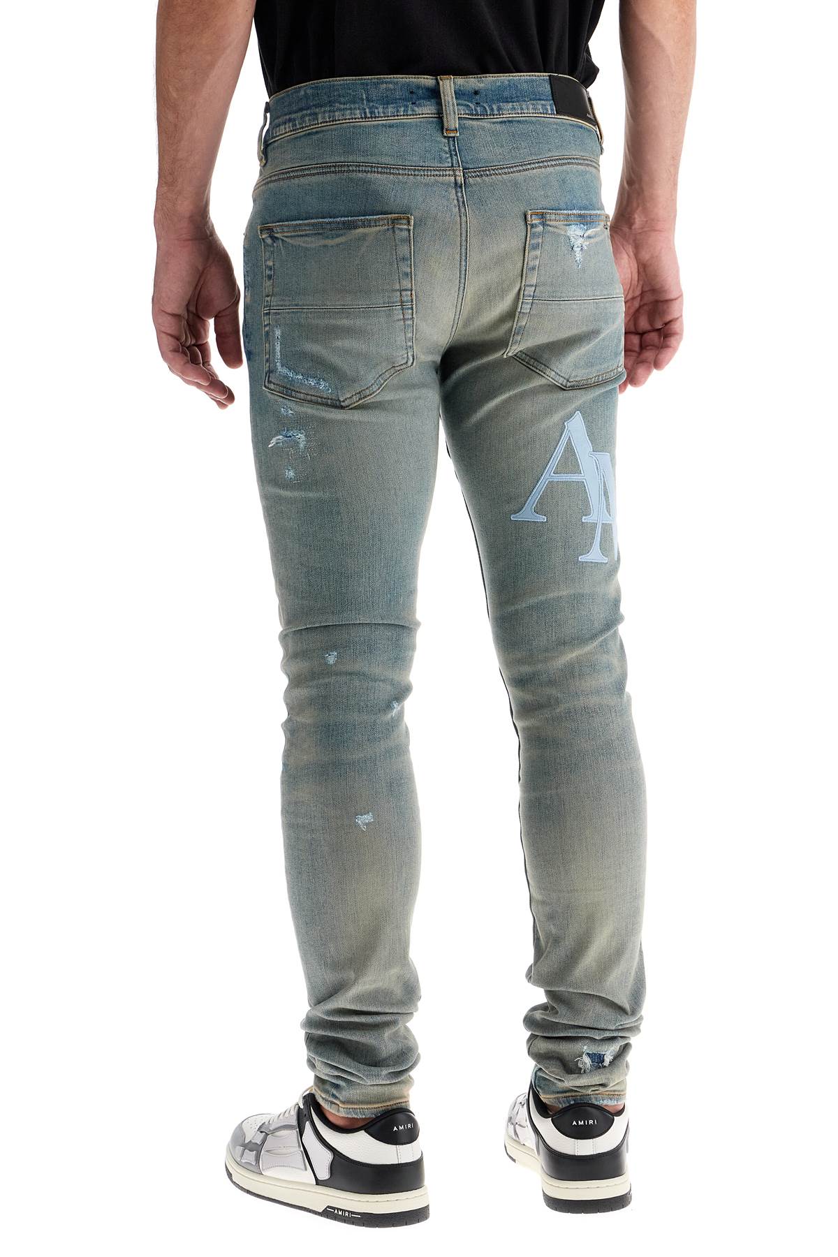 Amiri leather logo jeans with eight words image 2