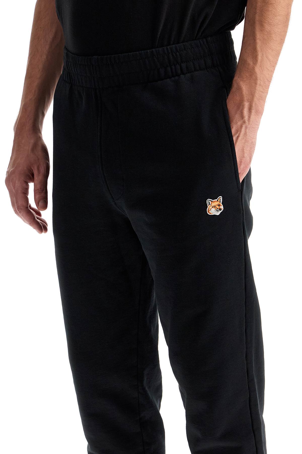 Maison Kitsune fox head joggers image 3