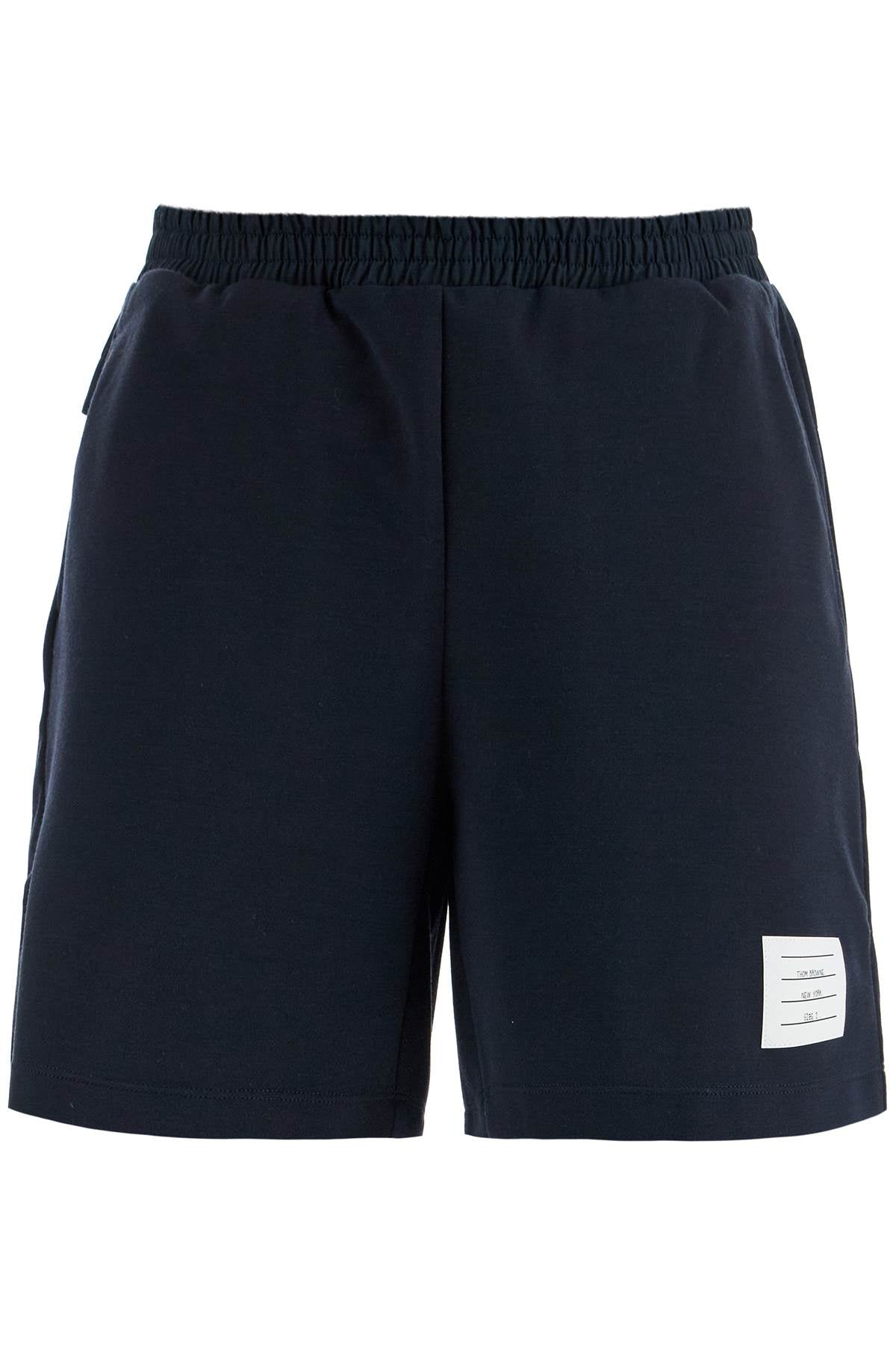 Thom Browne navy combo mid thigh ripstop and wool shorts image 0