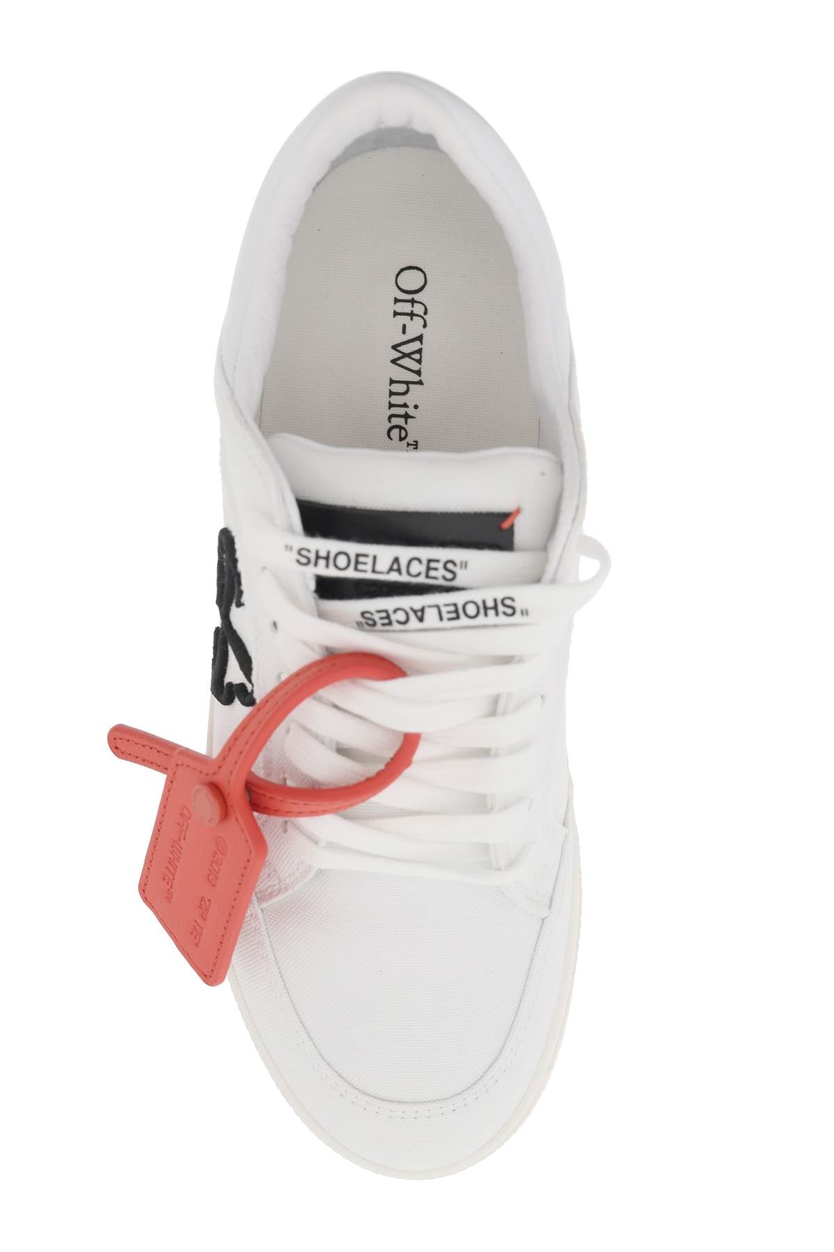 Off-White low canvas vulcanized sneakers in image 1